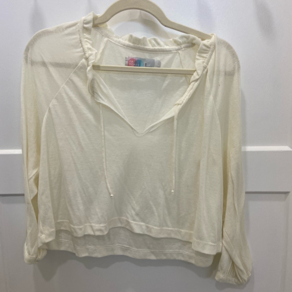 Free people Chic Cream Blouse with Ruffled Neckline